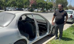 Adana'da park halindeki otomobilin kapılarını çalan zanlı tutuklandı