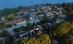 İzmir Seferihisar'daki orman yangınında 345 hanenin bulunduğu sitedeki bazı evler zarar gördü