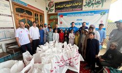 Milli güreşçi Rıza Kayaalp, Pakistan'da kurban organizasyonuna katıldı