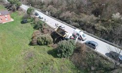 Arnavutköy'de hafriyat kamyonu çayırlık alana uçtu, ağaçların devrildiği alan havadan görüntülendi