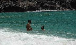 Alanya'da erken yaz görüntüleri: 21 dereceyi gören denize koştu