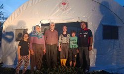 Kozan'da selden etkilenen vatandaşların yaraları sarılıyor