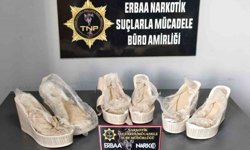 Yüksek ökçelerinden eroin çıktı