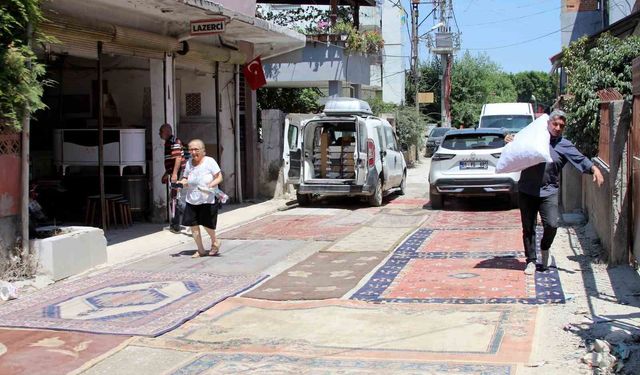 Mahallelinin toz isyanı: Yapılmayan yola halı serdiler