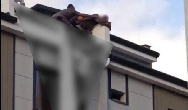 Eşiyle tartışıp çatıya çıkan genci Başkan son anda çekip aldı