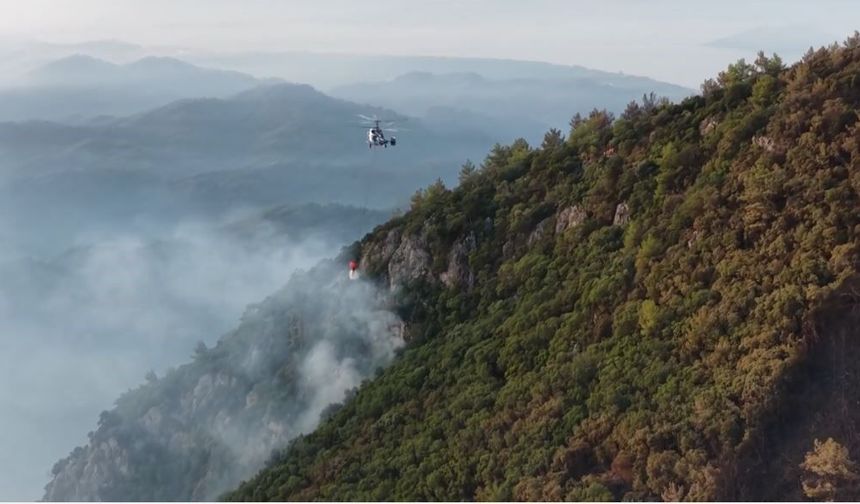Fethiye'de ekiplerin orman yangını ile ilgili mücadelesi sürüyor