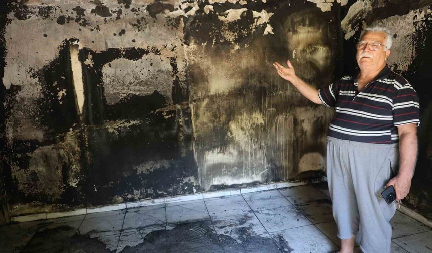 Yaşlı çiftin alevlere teslim olan 40 yıllık evlerinden geriye camı renklendiren çiçekleri kaldı